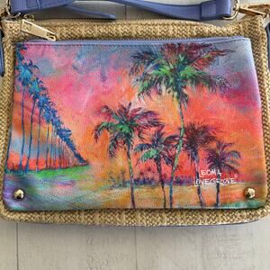 Leoma Lovegrove Vegan Leather & Straw Purse Crossbody with a palm tree beach
